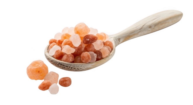 Close up of assorted small candies and nuts on a decorative spoon isolated on black