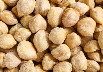 Full frame close-up of raw Candlenuts (Kemiri).