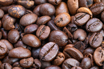 Freshly roasted coffee on countertop, Morning light highlights roasted coffee beans, Closeup of freshly roasted coffee beans prepared for brewing in rustic kitchen setting