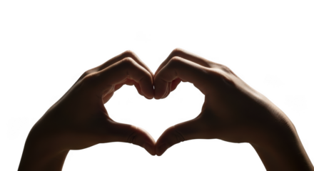 Hands form heart shape silhouette symbolizing love and connection against