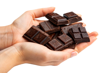 Female hands holding a generous handful of dark chocolate chunks with embossed surface for confectionery marketing and sweet dessert menus or healthy food blogs