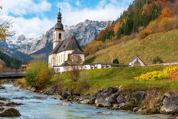 Church in an alpine scenery on a sunny day in autumn