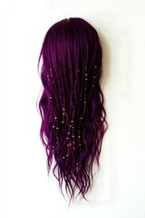 Long purple hair with beads on a white background.