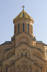 Close up of The Sameba Georgian Orthodox Cathedral with Golden Dome and Cross  in Tbilisi, Georgia