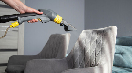 Deep cleaning of upholstered furniture at home using a steam cleaner for better hygiene and...