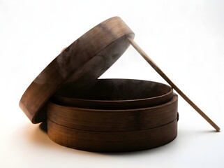Steaming hot food in a bamboo steamer with the lid ajar and a chopstick resting against it, against a white background.