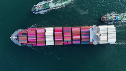 Tug boat pulling Container Cargo Ship go to Customs international logistics transportaion sea port. ship carrying container with tug boat freight transportaion service. Large Vessel Cargo export. - Powered by Adobe