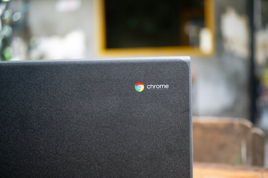 close up of google chrome logo on chromebook cover laptop