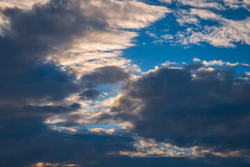 white and gray clouds in blue sky.	