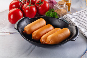 Boiled pork sausages for breakfast