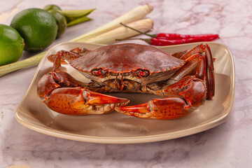 Gourmet steamed crab served lime