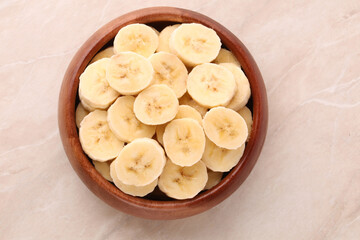 a rustic bowl of sliced ​​bananas
