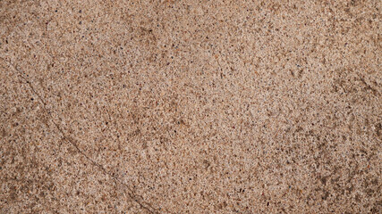 Gravel floor texture background in brown color with left side crack. Texture background of cement gravel. Tiny, chipped stone, cover, vintage, ground, classic concept for wallpaper, print, backdrop.