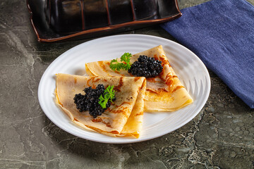 luxury pancake with black caviar