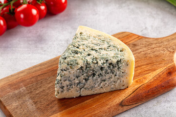 Blue cheese piece over board