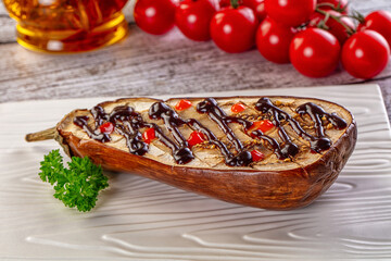 Baked eggplant half with teriyaki