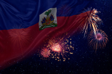 Flags of Haiti flutters in night sky with fireworks
