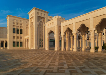 Fototapeta premium Elements of architecture of buildings, ancient arches, columns, windows and apertures. On the streets in Emirates, public places.