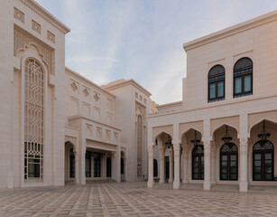 Elements of architecture of buildings, ancient arches, columns, windows and apertures. On the streets in Emirates, public places.
