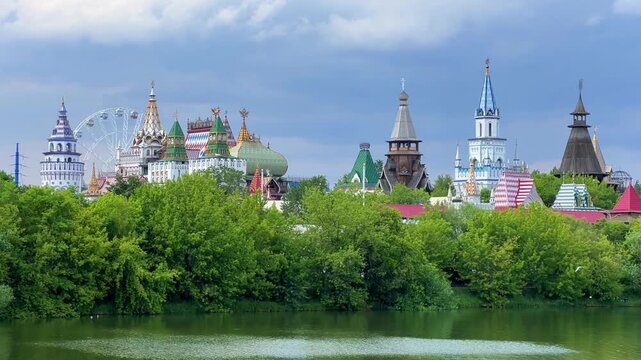 Russian traditional architecture, the Kremlin in Izmailovo, on the shore of a pond, Moscow. The architectural ensemble is stylized under Russian architecture of the 16-17 centuries. Gingerbread houses