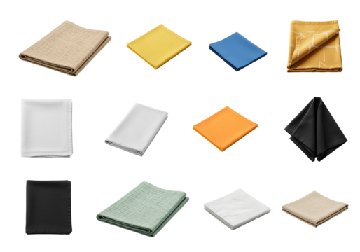 Folded napkin collection in assorted colors; napkin stacks and placemats in solids and stripes, napkin textures show soft cotton and linen weave, clean shapes on black for kitchen styling, dining vibe