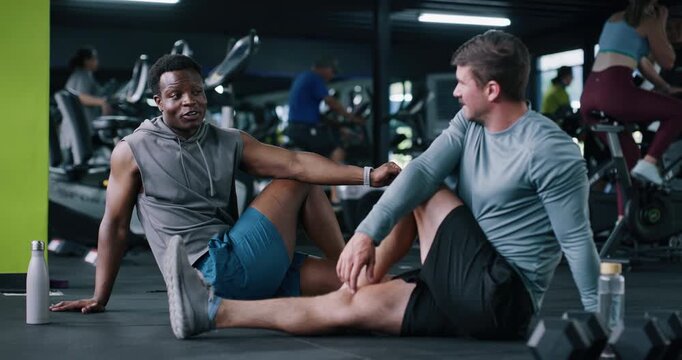 Smile, people and stretching for fitness at gym with discussion, training and flexibility routine. Friends, talking and warm up to prepare muscles, mobility workout and improve posture for wellness