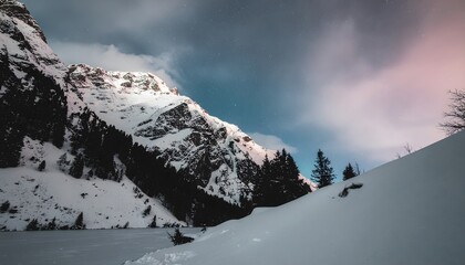 Explosive colors illuminating snowy peaks.