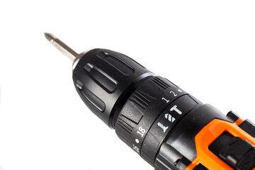 Cordless drill screwdriver with metal bit and torque adjustment ring against clean white...