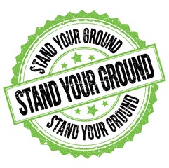STAND YOUR GROUND text on green-black round stamp sign