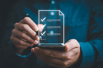 Person using a smartphone to complete a digital checklist with checkmarks showcasing mobile technology and task management for productivity and efficiency in modern workflows