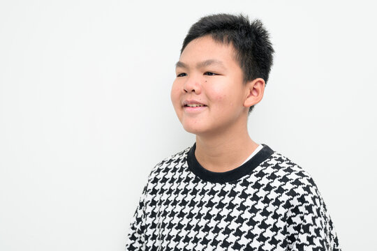 Asian Teenage Boy Studio Portrait on White Background Thinking