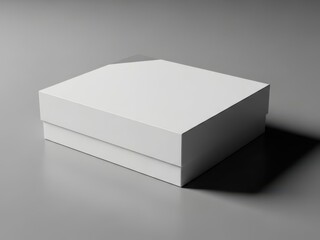 Fototapeta premium Clean white gift box on a gray surface with shadow