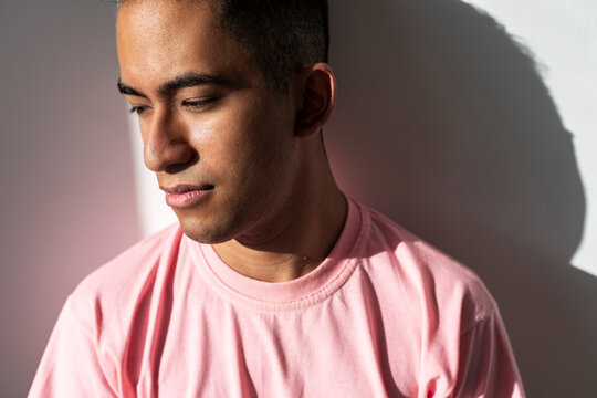 Studio shot of serene man in casual posture