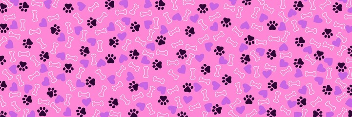Fototapeta premium Pink background with bone heart and cat paw prints, wide background