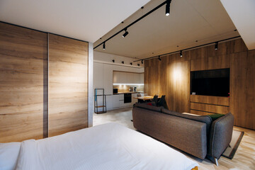 Contemporary loft with natural wood highlights and airy design