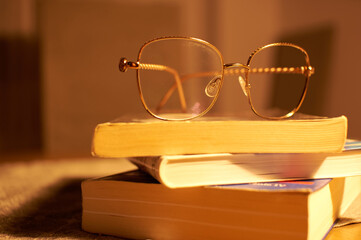 glasses on a book, learning and business © Mariusz