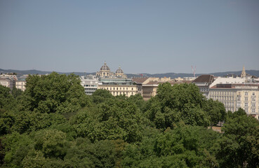 A view of Vienna from the Karlskirche, with the nearby park and the domes of Maria-Theresien-Platz visible.
