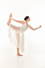 Young dancer performs vivid acrobatics in elegant white attire against a bright background