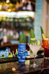 Colorful cocktails on the bar promise delicious flavors and fun times ahead