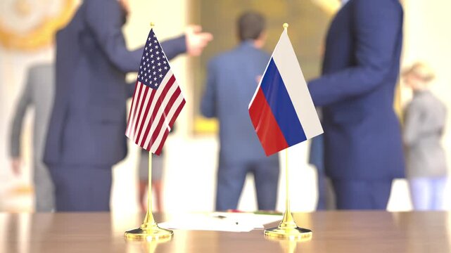 United States and Russia strategic talks with desk flags, 3D rendering