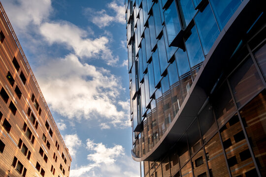 Urban architecture aligns skyscraper features with residential and offices, emphasizing contrast and facade patterns that define the mixed use environment throughout Paris in La Defense