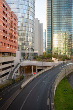 Architecture and skyscraper massing frame residential and offices, adding contrast and rhythm to the urban facade that represents the mixed use nature of Paris within La Defense