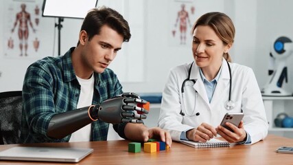 Young man with prosthetic arm performing rehabilitation exercises with blocks. Female doctor monitoring progress on smartphone in a clinic. Medical technology and recovery concept - Powered by Adobe