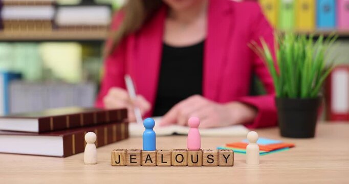 Explore the theme of jealousy in a creative workspace filled with vibrant colors and engaging learning tools