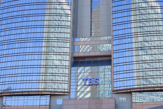TOKYO, JAPAN - November 30, 2025: Detail of TBS Broadcasting Center in Tokyo's Akasaka area.