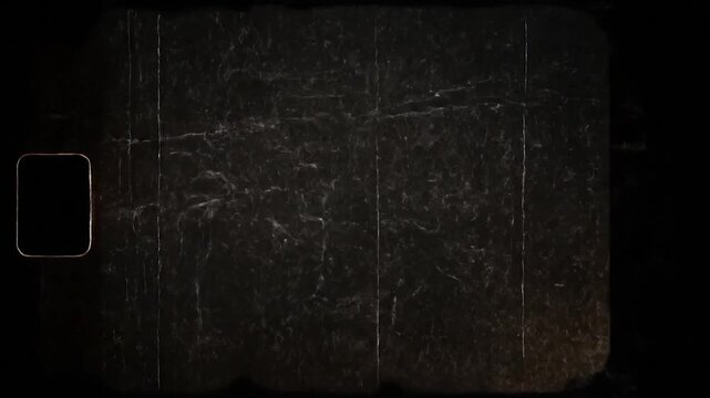 Dark film strip with frame and light streaks, textured with a distressed look
