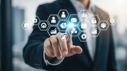 Businessman touching virtual screen with digital icons representing modern business technology and future innovation concepts