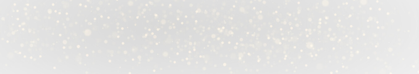 Abstract Golden Sparkle Light with Shimmering Stardust, Glowing Dust and Bright Bokeh Effect