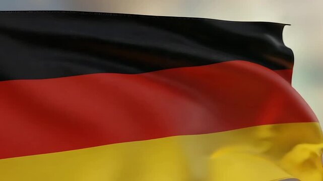 Germany flag waving in the wind, ideal for patriotic themes and national holiday celebrations,