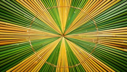 Obraz premium green and yellow bamboo planks converge at the center forming a radial sunburst pattern background art